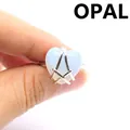 Heart-shaped opal ring with silver-tone band for women in minimalist style - Opal