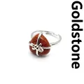 Elegant heart shaped goldstone ring featuring a silver bow accent band for women - Gold Sandstone