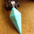 Turquoise-style hexagonal double-pointed cone pendant necklace with silver-tone bail. - Turquoise