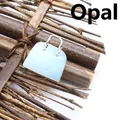 Handtaschen-Anhänger aus Opalith, blau-transparenter Naturstein für feinen Schmuck - Opal