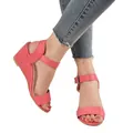 Close-up detail of coral pink suede-like wedge sandals with adjustable ankle strap - 35 / Pink
