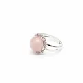 Close-up of a silver ring with a round pink quartz stone and a beaded halo setting. - Rose Quartz