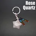 Handcrafted star-shaped rose quartz crystal keychain with a colorful bead tassel - Rose Quartz