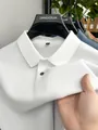 Polo classica da uomo in cotone bianco con trama piqué fine - Taglia M / Top / Bianco