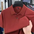 Red men's short-sleeved cotton polo shirt featuring breathable textured pique fabric detail - Red