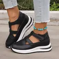 Detailed view of black breathable platform sandals with velcro straps on model. - 35 / Black (9930)