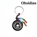 Natuurlijke zwarte obsidiaan donut sleutelhanger met zeven kleurrijke chakra kralen - Obsidiaan