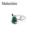Elegant silver-tone antler ring featuring a natural green tear-drop malachite stone - Malachite