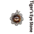 Vintage flower-shaped pendant necklace featuring natural brown tiger eye stone inlay. - Tiger's Eye