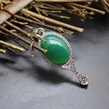 Elegant silver-toned magic mirror pendant featuring a smooth green agate stone inlay - Green Agate