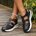 Detail view of women's black platform sandals with cut-out design and velcro strap. - 35 / Black (9928)