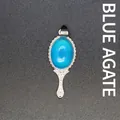 Vintage silver magic mirror pendant featuring a smooth blue agate cabochon - Blue Agate