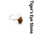Minimalist silver-colored adjustable ring with a natural round Tiger's Eye stone - Tiger's Eye