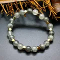 Close-up of grey natural stone beads with gold cube spacers in a beaded bracelet. - Gray Natural Stone Style / 8mm Bead
