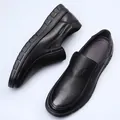 Top-down view of black genuine cowhide leather loafers with 'FASHION' label details - 37 / Black