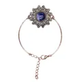 Vintage Bronze-Blumenarmband mit einem polierten Naturstein mit blauer Maserung - Sodalith-Stil