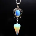 Vintage silver filigree necklace featuring a hexagonal opal point crystal pendant - Opal