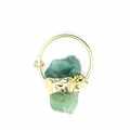 Detailed close-up view of a raw green crystal stone pendant with textured gold band - Green Fluorite (Gold)