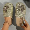 Close-up of sparkling sequined clogs with butterfly accent and comfortable thick sole - 36 / Gold