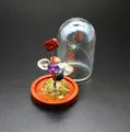 Detail of a mini crystal tree of life with natural stones and a glass dome cover. - Chakra Seven Color
