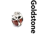 Cute silver-plated frog prince pendant clutching a sparkling brown goldstone bead - Gold Sandstone