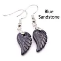 Elegantes pendientes colgantes de ala de piedra azul con efecto de brillo estelar - Piedra de Arena Azul
