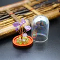 Detail view of mini amethyst crystal tree specimen with glass dome and wooden base - Amethyst