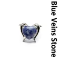 Bague élégante en argent double dauphin avec une pierre de sodalite bleue naturelle en cœur. - Sodalite bleue