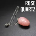 Natural rose quartz egg-shaped stone dowsing pendulum with silver metal chain link - Rose Quartz
