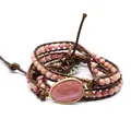 Handmade woven multi-layer wrap bracelet featuring a pink natural rhodochrosite stone - Rhodonite