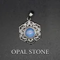 Silver hollow-out mandala floral pendant with a central round blue opalite stone. - Opalite (aljylp1545)