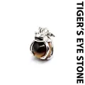 Exquisite silver frog prince pendant holding a natural round tiger's eye stone bead - Tiger's Eye