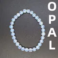 Elegant handmade 6mm opal beaded bracelet with translucent natural gemstone beads - 6mm / Opal