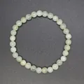 Elegant minimalist 6mm natural pale green stone round bead stretch bracelet for women - 6mm / Xinschan Jade