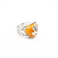 Silver adjustable ring featuring a heart-shaped yellow jade and intricate rose designs - Topaz
