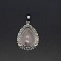 Elegant vintage teardrop rose quartz gemstone pendant with ornate silver filigree frame - Rose Quartz