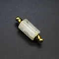 Macro view of a cylindrical white crystal aromatherapy bottle pendant with gold accents - White Crystal / Gold