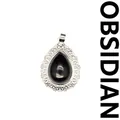 Natural teardrop obsidian gemstone pendant with an ornate silver filigree border - Obsidian