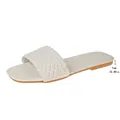 Dettaglio ravvicinato del tacco da 1 cm dei sandali piatti intrecciati bianchi da donna - 36 / Bianco