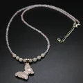 Detail shot of an elegant pink butterfly pendant on an iridescent beaded crystal necklace - Rose Quartz