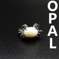 Kreativer silberner Krabbenring mit weißem ovalem Opalstein - Opal Krabbenring