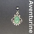 Elegant natural green aventurine gemstone pendant in ornate silver-tone hollow setting - Aventurine Jade