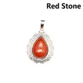 Vintage teardrop red stone pendant featuring an ornate silver filigree border detail - Red Jasper