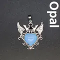 Exquisite heart-shaped light blue opalite pendant featuring a silver crown and wing design - Opal