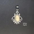 Elegant vintage silver plated pendant featuring a smooth oval white agate gemstone - Agate