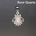 Elegant vintage silver-plated pendant featuring a polished oval rose quartz stone - Rose Quartz