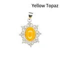 Ornate silver-tone hollow-out pendant with oval yellow natural stone - Topaz