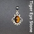 Vintage silver pendant with oval natural tiger eye stone and crystal accents - Tiger's Eye