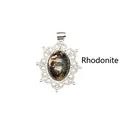 Natural Rhodonite stone pendant necklace with a hollowed silver-colored lace frame - Rhodonite