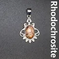 Vintage rhodonite natural stone pendant with clear crystal accents in silver frame - Rhodonite